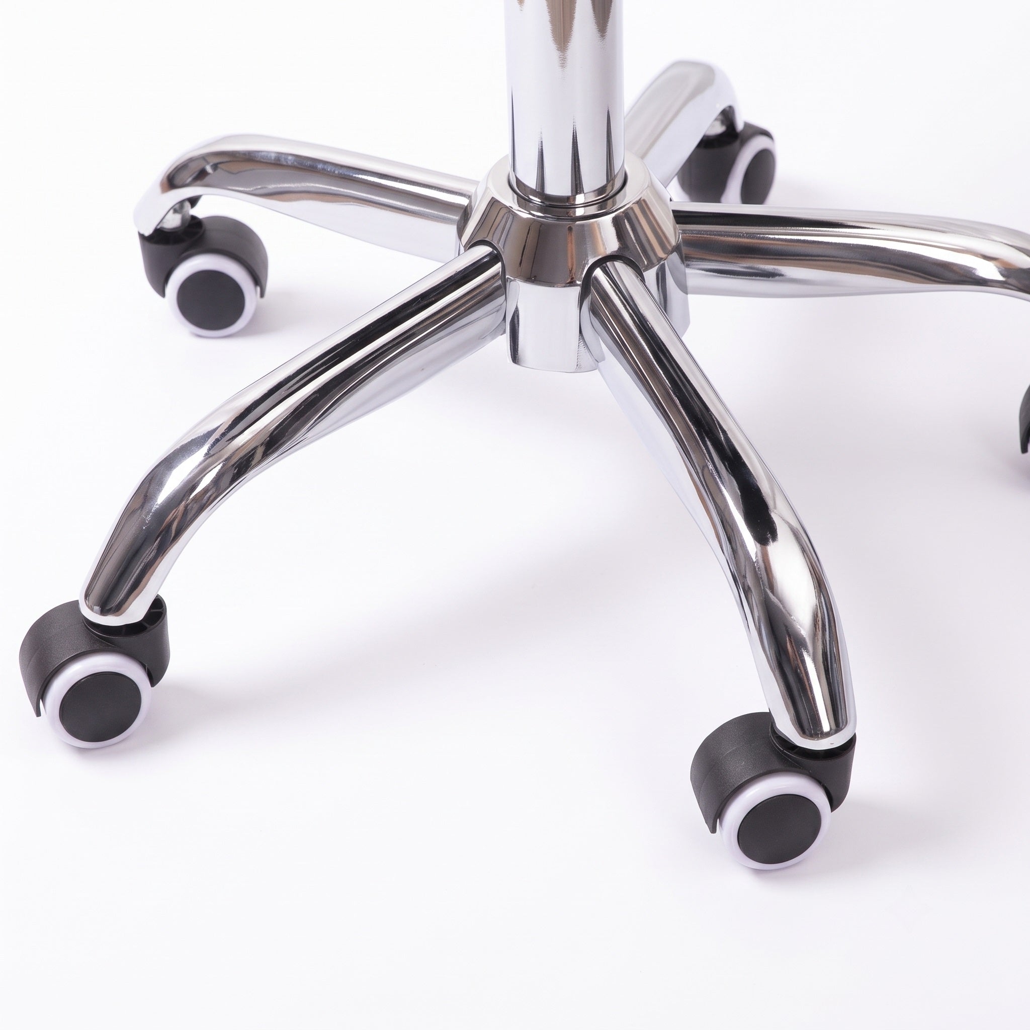Chrome metal base and smooth rolling wheels of vanity chair