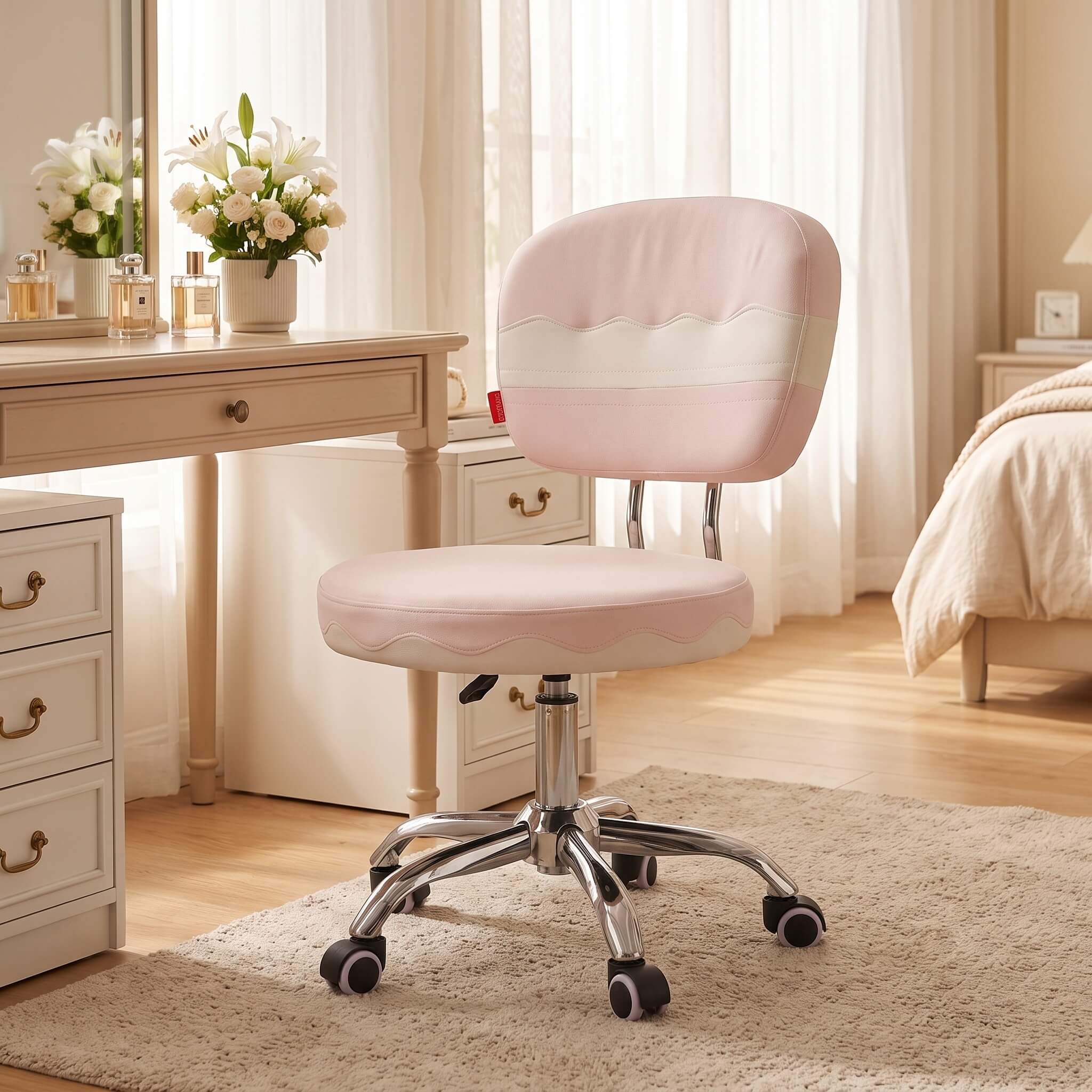 Adjustable height pink vanity chair in front of vanity table
